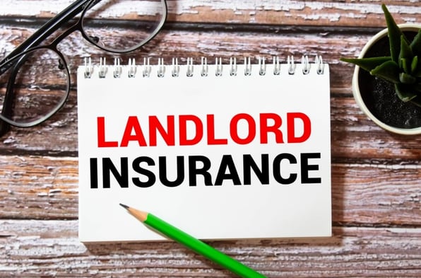 A notepad that says landlord insurance
